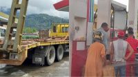 Antrean salah satu SPBU di Pasaman terlihat ada plat merah roda 10 antre BBM Solar, dan pengisian jeriken, pada 1 Desember 2021.